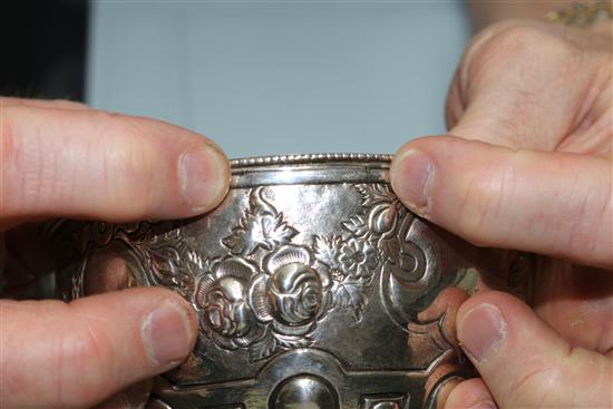 A 19th century Indian Colonial embossed silver sugar bowl by Cooke & Kelvey, Calcutta, 6.5 oz.